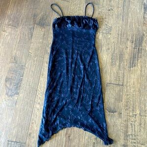 Pretty blue dress with glittery floral detail on fabric.
